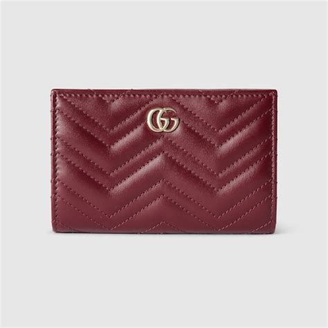 Chain wallet with Gucci script in Rosso Ancora red leather.